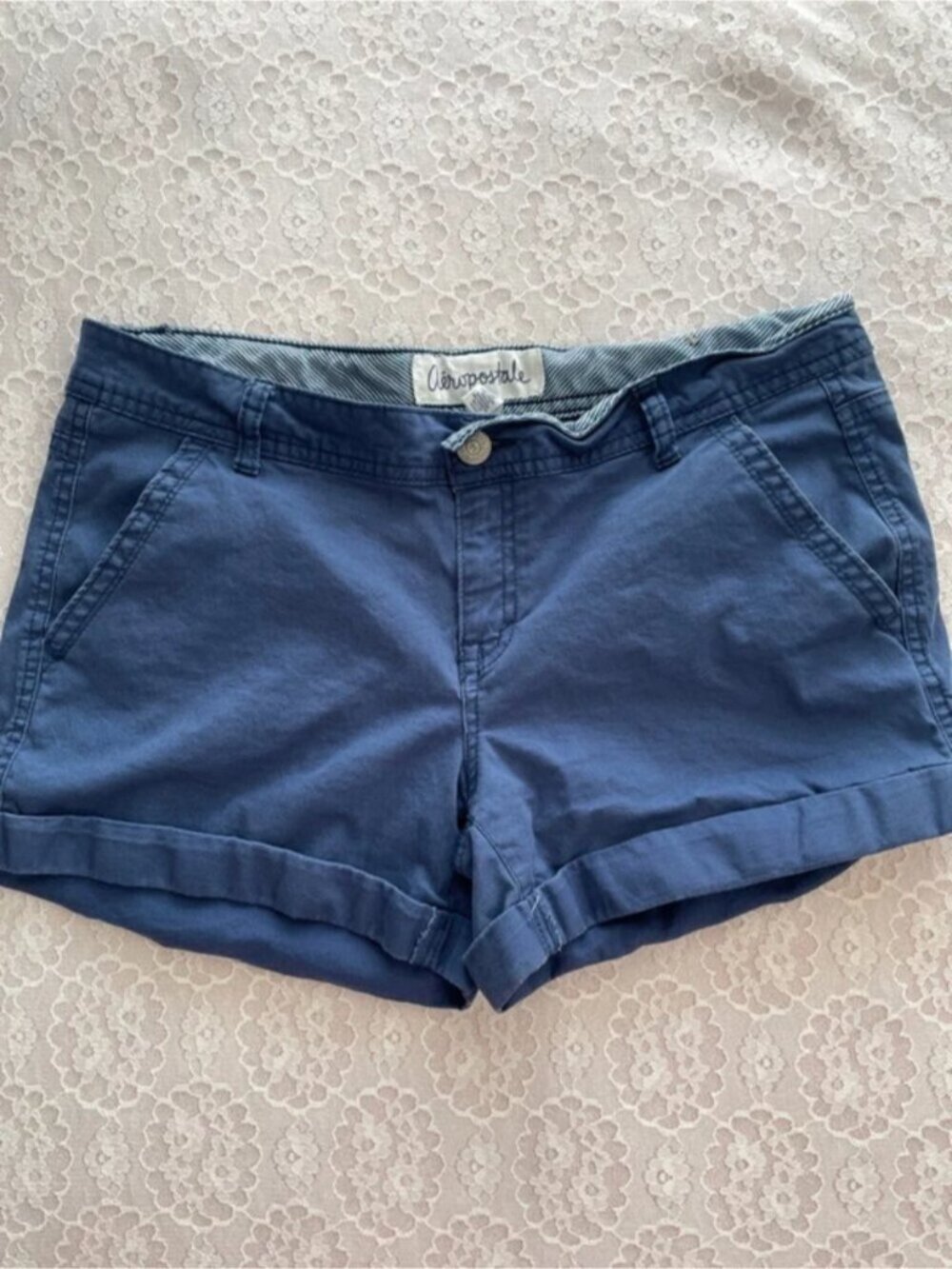 blue midi rise shorts